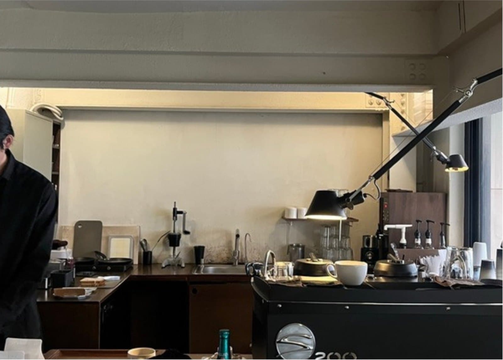 The counter of a small neighbourhood cafe in Seoul